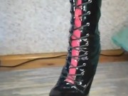 Mistress Katrix show her high heels and latex pants